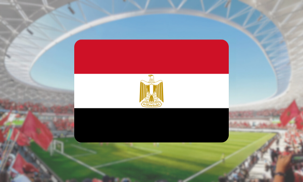 Egypt’s flag displayed in front of a football stadium.